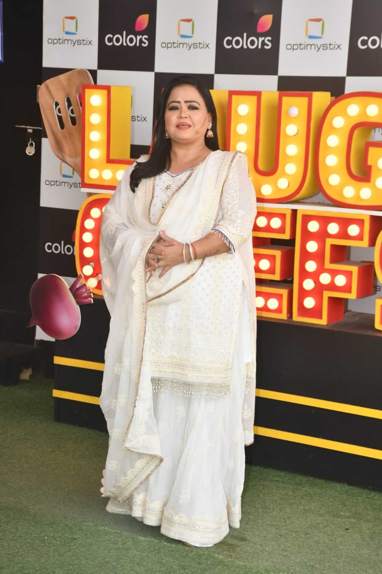 Bharti Singh was seen wearing an ivory sharara set as she arrived on the sets of Laughter Chefs.